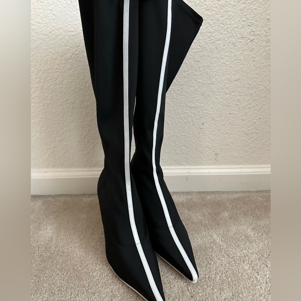 Black and white heeled boots. Size 6.5